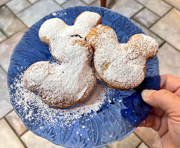 Three Mickey Mouse Beignets with powdered sugar